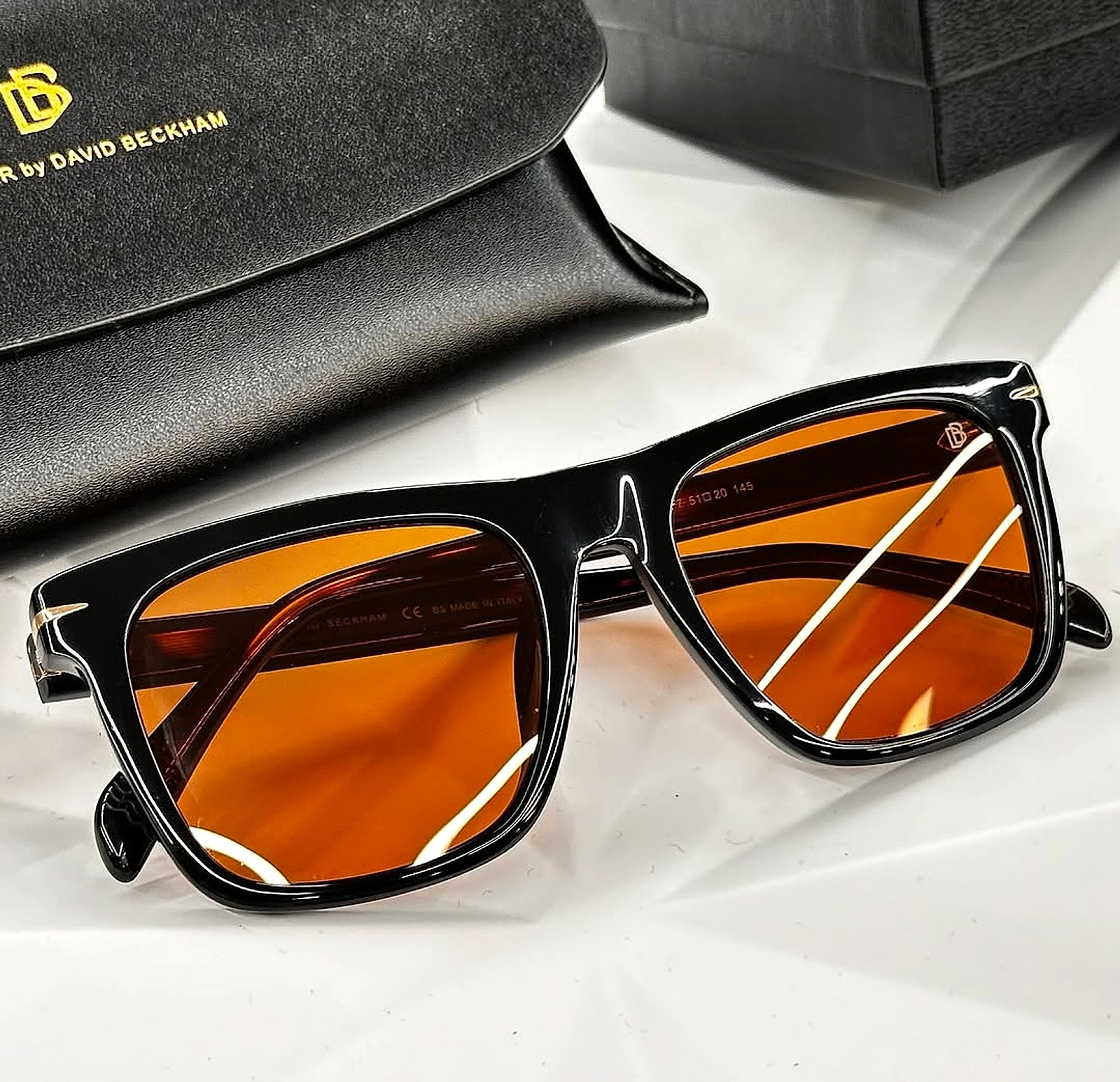 David B In Orange Black